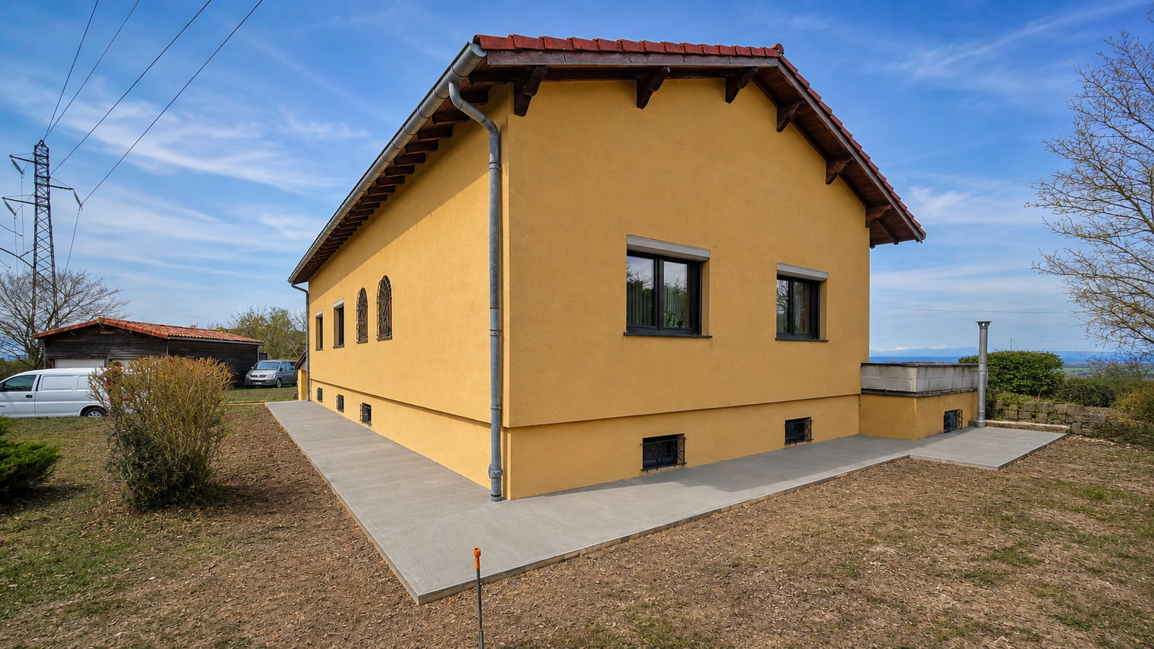 Trottoir périphérique réalisé autour d'une maison